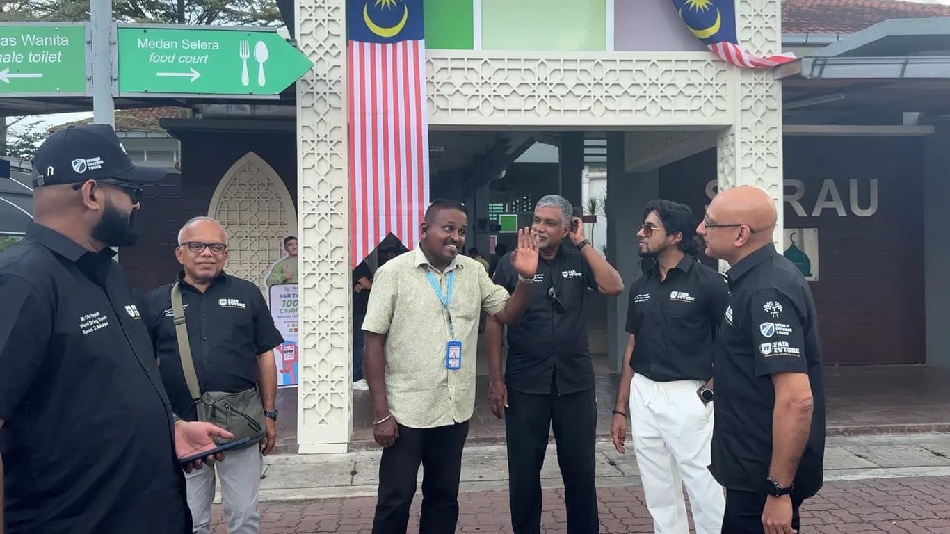 Malaysian flag flying high on an off-road convoy route, part of a tailored Fair Future adventure tour